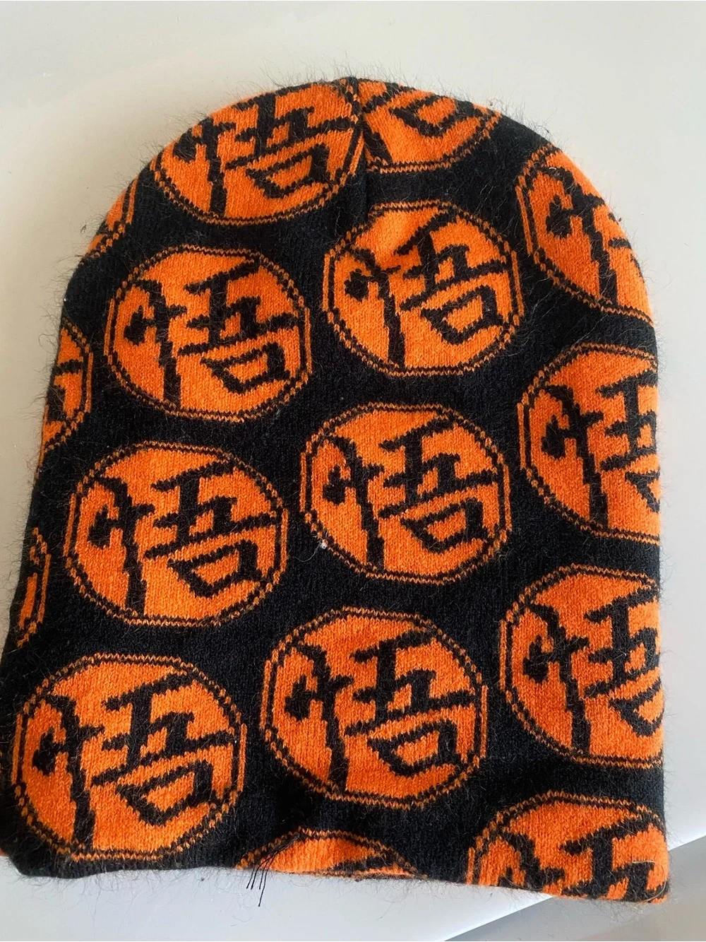 Black and Orange Graphic Knit Beanie Hat